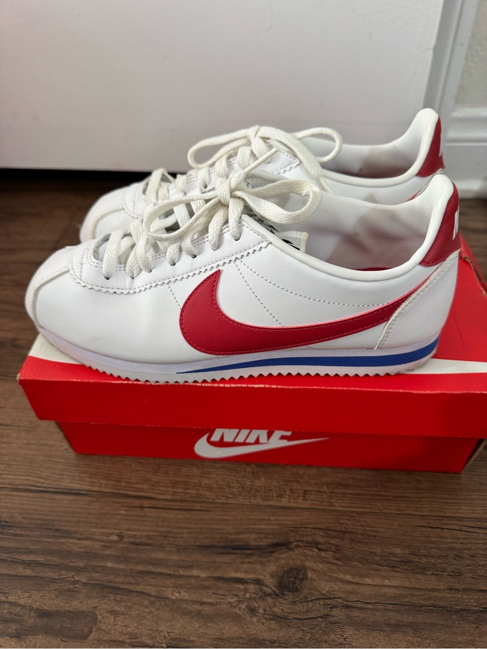 Nike White Sneakers with Red Swoosh